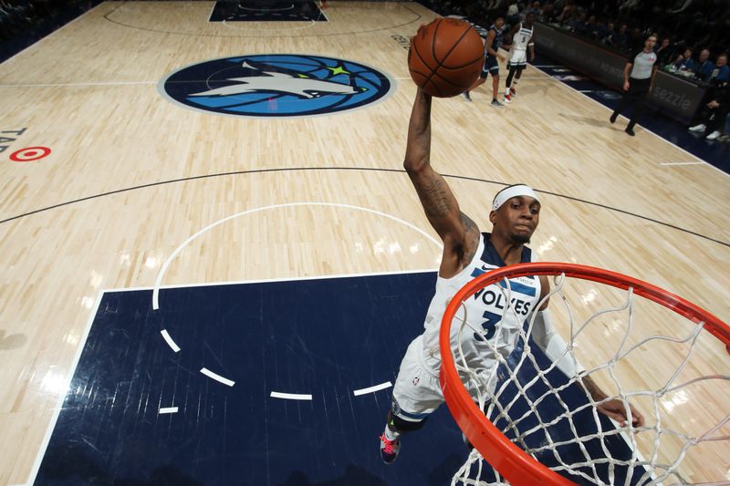 MINNEAPOLIS, MN -  JANUARY 11: Jaden McDaniels #3 of the Minnesota Timberwolves dunks the ball during the game against the Memphis Grizzlies on January 11, 2025 at Target Center in Minneapolis, Minnesota. NOTE TO USER: User expressly acknowledges and agrees that, by downloading and or using this Photograph, user is consenting to the terms and conditions of the Getty Images License Agreement. Mandatory Copyright Notice: Copyright 2025 NBAE (Photo by Jordan Johnson/NBAE via Getty Images)