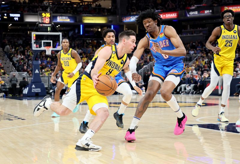 INDIANAPOLIS, INDIANA - MARCH 31: T.J. McConnell #9 of the Indiana Pacers against the Oklahoma City Thunder at Gainbridge Fieldhouse on March 31, 2023 in Indianapolis, Indiana.    NOTE TO USER: User expressly acknowledges and agrees that, by downloading and/or using this photograph, User is consenting to the terms and conditions of the Getty Images License Agreement. (Photo by Andy Lyons/Getty Images)