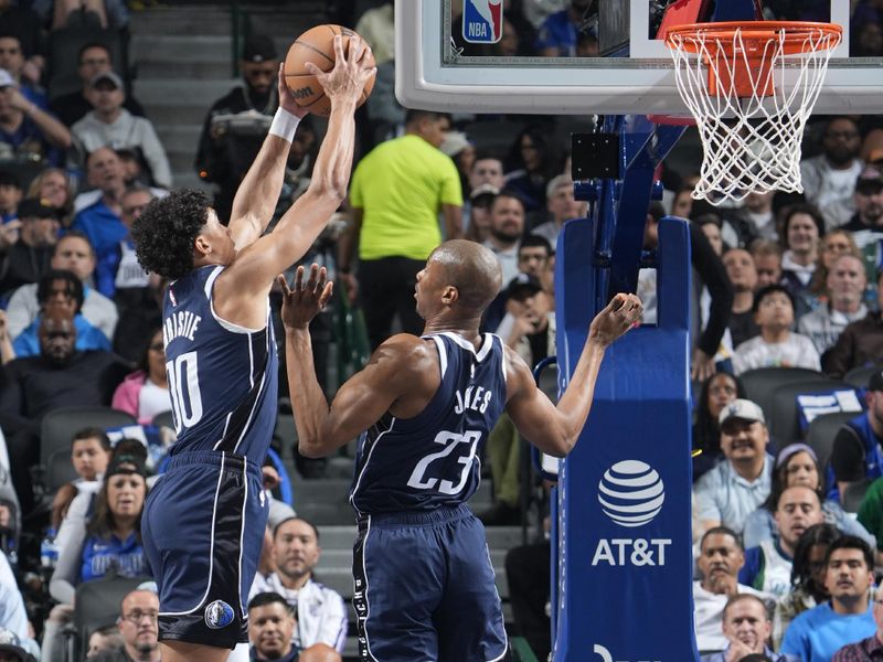 DALLAS, TX - MARCH 3: Max Christie #00 of the Dallas Mavericks grabs the rebound during the game against the Sacramento Kings on March 3, 2025 at American Airlines Center in Dallas, Texas. NOTE TO USER: User expressly acknowledges and agrees that, by downloading and or using this photograph, User is consenting to the terms and conditions of the Getty Images License Agreement. Mandatory Copyright Notice: Copyright 2025 NBAE (Photo by Glenn James/NBAE via Getty Images)