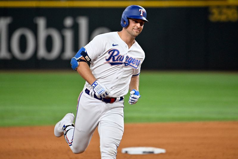 Oct 10, 2023; Arlington, Texas, USA; Texas Rangers first baseman Nathaniel Lowe (30) runs the bases after hitting a solo home run against the Baltimore Orioles in the sixth inning during game three of the ALDS for the 2023 MLB playoffs at Globe Life Field. Mandatory Credit: Jerome Miron-USA TODAY Sports