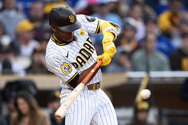 Apr 20, 2024; San Diego, California, USA; San Diego Padres left fielder Jose Azocar (28) singles during the fourth inning against the Toronto Blue Jays at Petco Park. Mandatory Credit: Orlando Ramirez-USA TODAY Sports