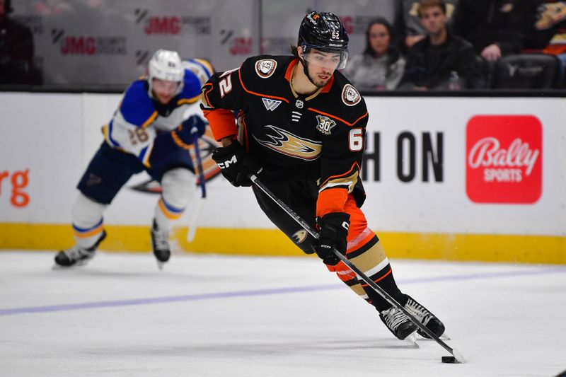 Apr 7, 2024; Anaheim, California, USA; Anaheim Ducks center Nikita Nesterenko (62) moves the puck against the Anaheim Ducks during the second period at Honda Center. Mandatory Credit: Gary A. Vasquez-USA TODAY Sports