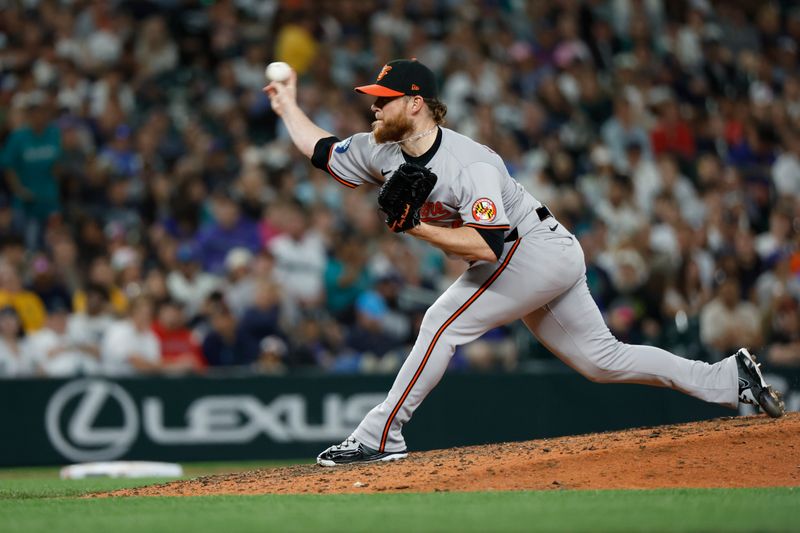 Jul 3, 2024; Seattle, Washington, USA; Baltimore Orioles relief pitcher Craig Kimbrel (46) throws against the Seattle Mariners during the ninth inning at T-Mobile Park. Mandatory Credit: Joe Nicholson-USA TODAY Sports
