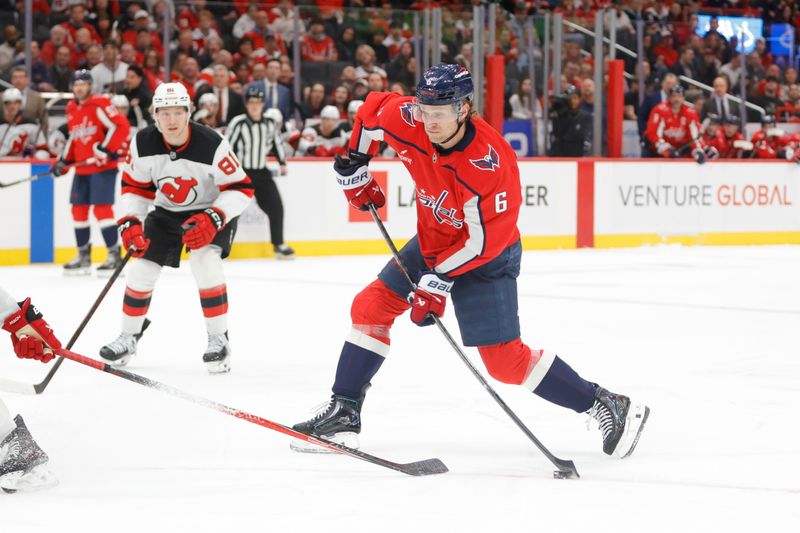 Mar 20, 2026; Washington, District of Columbia, USA; Washington Capitals defenseman Jakob Chychrun (6) shoots the puck against the New Jersey Devils during the first period at Capital One Arena. Mandatory Credit: Amber Searls-Imagn Images