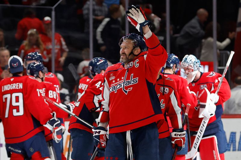 Nov 2, 2024; Washington, District of Columbia, USA; Washington Capitals left wing Alex Ovechkin (8) waves to family in the stands after the Capitals' game against the Columbus Blue Jackets at Capital One Arena. Mandatory Credit: Geoff Burke-Imagn Images