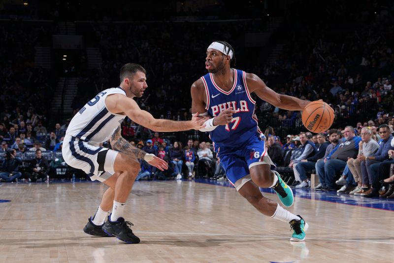 PHILADELPHIA, PA - MARCH 6: Buddy Heild #17 of the Philadelphia 76ers handles the ball during the game against the Memphis Grizzlies on March 6, 2024 at the Wells Fargo Center in Philadelphia, Pennsylvania NOTE TO USER: User expressly acknowledges and agrees that, by downloading and/or using this Photograph, user is consenting to the terms and conditions of the Getty Images License Agreement. Mandatory Copyright Notice: Copyright 2024 NBAE (Photo by Jesse D. Garrabrant/NBAE via Getty Images)