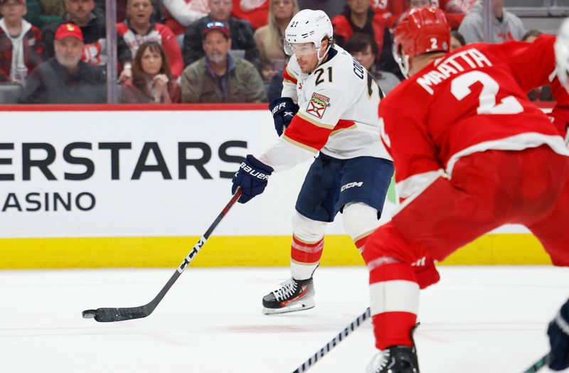 Mar 2, 2024; Detroit, Michigan, USA; Florida Panthers center Nick Cousins (21) skates with the puck in the first period against the Detroit Red Wings at Little Caesars Arena. Mandatory Credit: Rick Osentoski-USA TODAY Sports