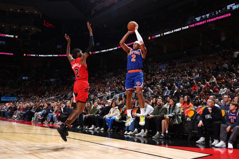 TORONTO, CANADA - MARCH 27: Miles McBride #2 of the New York Knicks shoots the ball during the game against the Toronto Raptors on March 27, 2024 at the Scotiabank Arena in Toronto, Ontario, Canada.  NOTE TO USER: User expressly acknowledges and agrees that, by downloading and or using this Photograph, user is consenting to the terms and conditions of the Getty Images License Agreement.  Mandatory Copyright Notice: Copyright 2024 NBAE (Photo by Vaughn Ridley/NBAE via Getty Images)