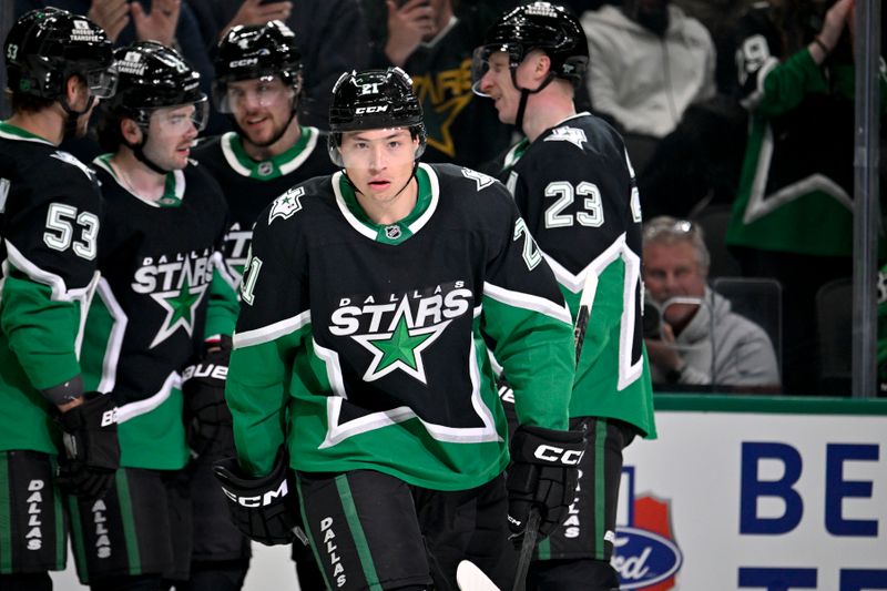 Mar 12, 2026; Dallas, Texas, USA; Dallas Stars defenseman Miro Heiskanen (4) and left wing Jason Robertson (21) and center Wyatt Johnston (53) and defenseman Esa Lindell (23) and center Mavrik Bourque (22) celebrate the second goal scored by Robertson against the Edmonton Oilers during the second period at the American Airlines Center. Mandatory Credit: Jerome Miron-Imagn Images