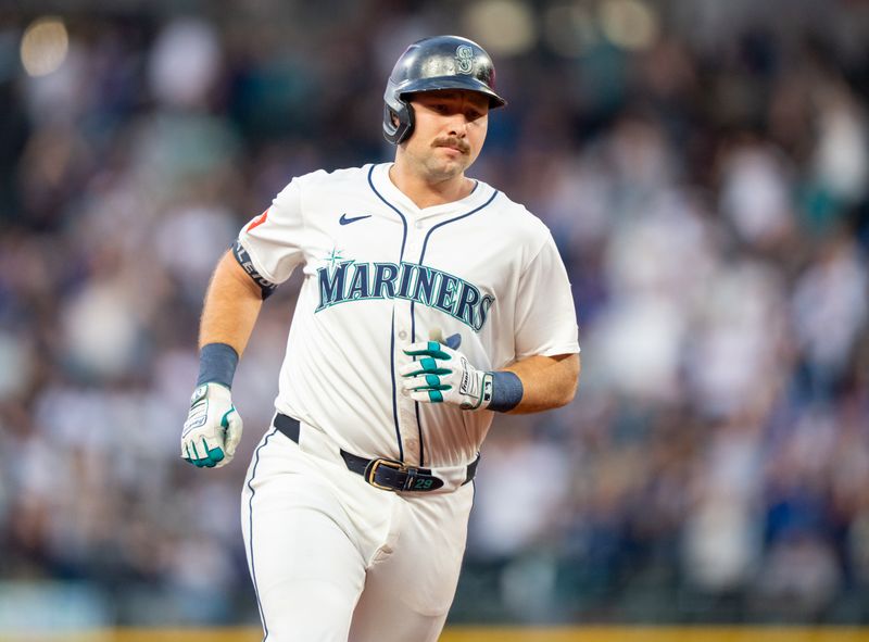 Sep 24, 2025; Seattle, Washington, USA; Seattle Mariners catcher Cal Raleigh (29) rounds the bases after hitting a solo home run during the first inning against the Colorado Rockies at T-Mobile Park. Mandatory Credit: Stephen Brashear-Imagn Images