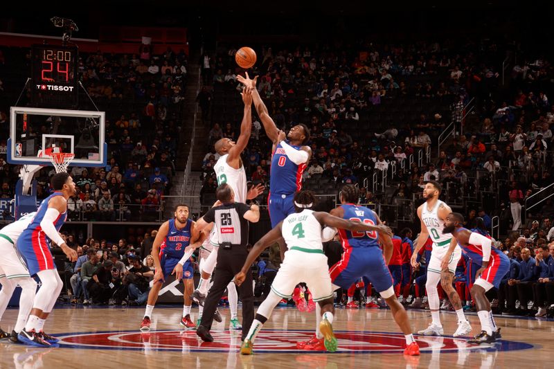 DETROIT, MI - OCTOBER 26: Detroit Pistons and Boston Celtics go up for a jump ball during a regular season game on October 26, 2024 at Little Caesars Arena in Detroit, Michigan. NOTE TO USER: User expressly acknowledges and agrees that, by downloading and/or using this photograph, User is consenting to the terms and conditions of the Getty Images License Agreement. Mandatory Copyright Notice: Copyright 2024 NBAE (Photo by Brian Sevald/NBAE via Getty Images)