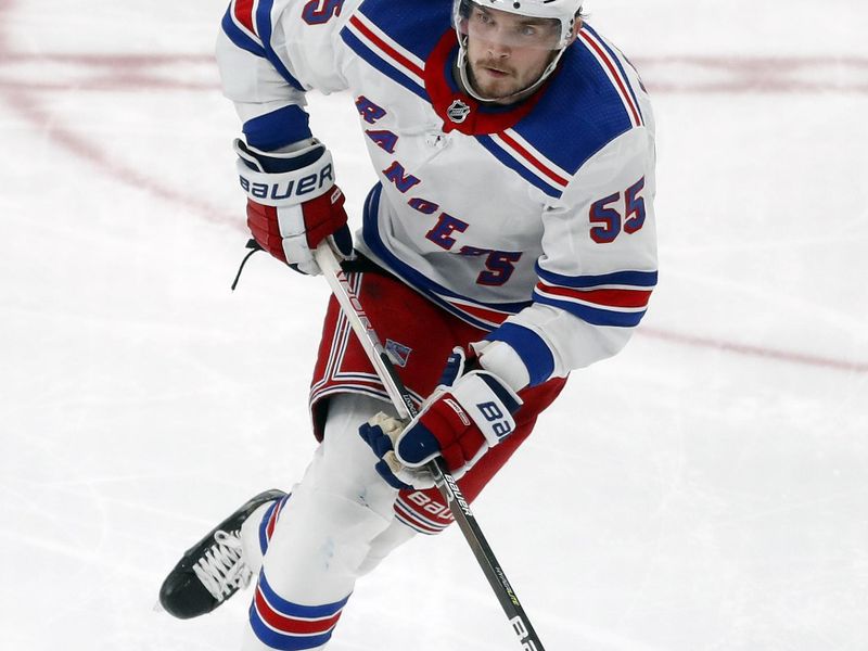 Mar 16, 2024; Pittsburgh, Pennsylvania, USA;  New York Rangers defenseman Ryan Lindgren (55) skates up ice with the puck against the Pittsburgh Penguins during the third period at PPG Paints Arena. New York won 7-4. Mandatory Credit: Charles LeClaire-USA TODAY Sports