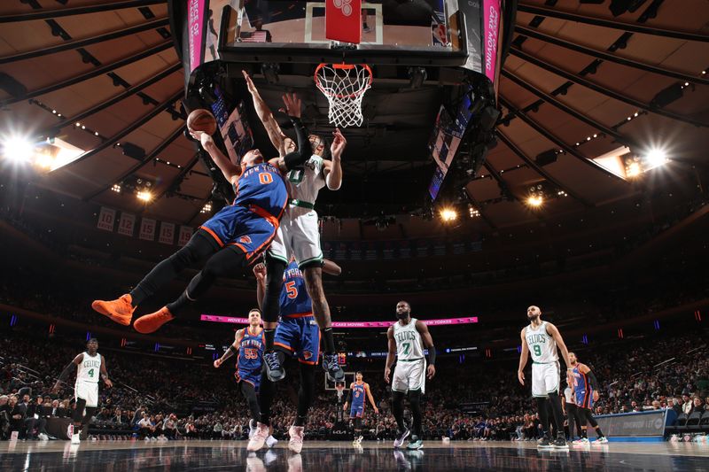 NEW YORK, NY - FEBRUARY 24: Donte Divincenzo #0 of the New York Knicks drives to the basket during the game against the Boston Celtics on February 24, 2024 at Madison Square Garden in New York City, New York.  NOTE TO USER: User expressly acknowledges and agrees that, by downloading and or using this photograph, User is consenting to the terms and conditions of the Getty Images License Agreement. Mandatory Copyright Notice: Copyright 2024 NBAE  (Photo by Nathaniel S. Butler/NBAE via Getty Images)