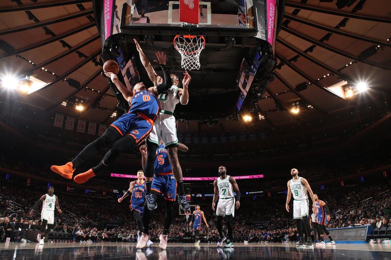 NEW YORK, NY - FEBRUARY 24: Donte Divincenzo #0 of the New York Knicks drives to the basket during the game against the Boston Celtics on February 24, 2024 at Madison Square Garden in New York City, New York.  NOTE TO USER: User expressly acknowledges and agrees that, by downloading and or using this photograph, User is consenting to the terms and conditions of the Getty Images License Agreement. Mandatory Copyright Notice: Copyright 2024 NBAE  (Photo by Nathaniel S. Butler/NBAE via Getty Images)