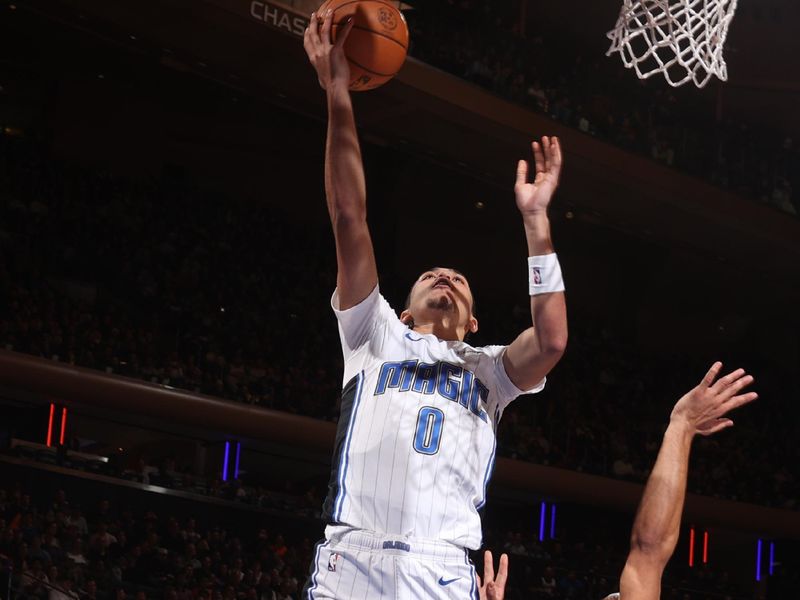 NEW YORK, NY - JANUARY 6: Anthony Black #0 of the Orlando Magic drives to the basket during the game against the New York Knicks on January 6, 2025 at Madison Square Garden in New York City, New York.  NOTE TO USER: User expressly acknowledges and agrees that, by downloading and or using this photograph, User is consenting to the terms and conditions of the Getty Images License Agreement. Mandatory Copyright Notice: Copyright 2025 NBAE  (Photo by Nathaniel S. Butler/NBAE via Getty Images)