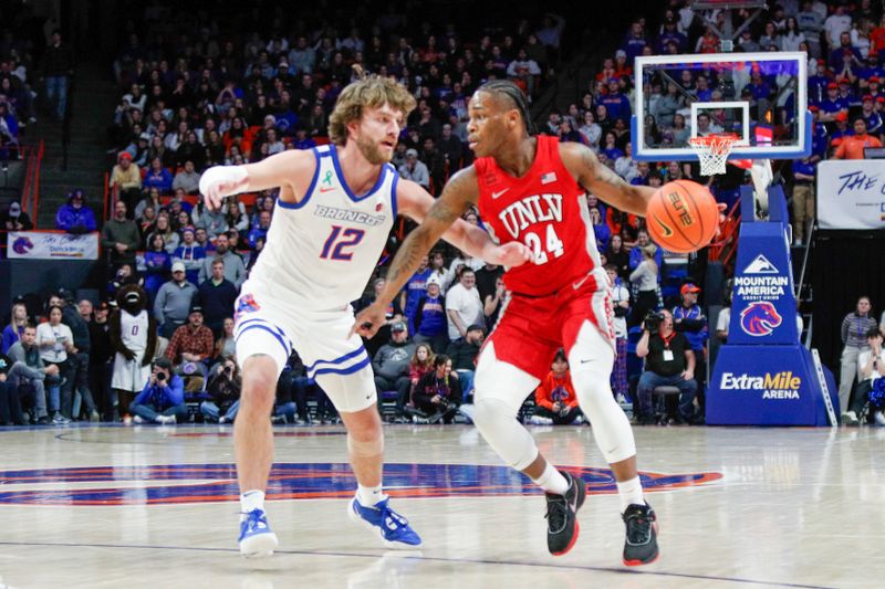 Jan 16, 2024; Boise, Idaho, USA; UNLV Rebels guard Jackie Johnson III (24) works against Boise State Broncos guard Max Rice (12) during the first half at ExtraMile Arena. Mandatory Credit: Brian Losness-USA TODAY Sports

