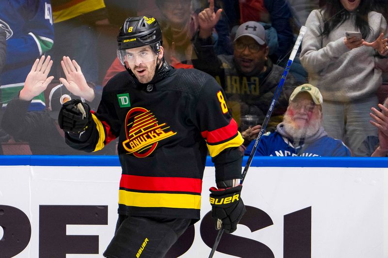 Apr 10, 2024; Vancouver, British Columbia, CAN; Vancouver Canucks forward Conor Garland (8) celebrates his goal against the Arizona Coyotes in the third period at Rogers Arena. Arizona won 4-3 in overtime. Mandatory Credit: Bob Frid-USA TODAY Sports