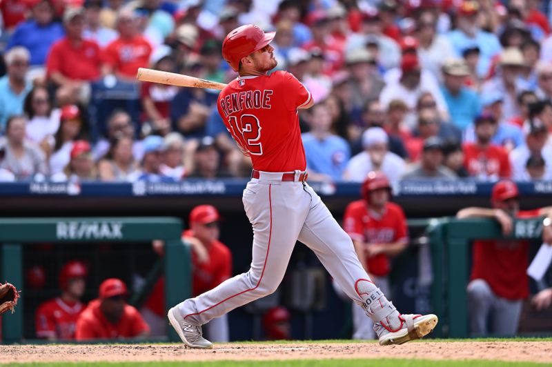 Aug 30, 2023; Philadelphia, Pennsylvania, USA; Los Angeles Angels outfielder Hunter Renfroe (12) hits an RBI single against the Philadelphia Phillies in the eighth inning at Citizens Bank Park. Mandatory Credit: Kyle Ross-USA TODAY Sports