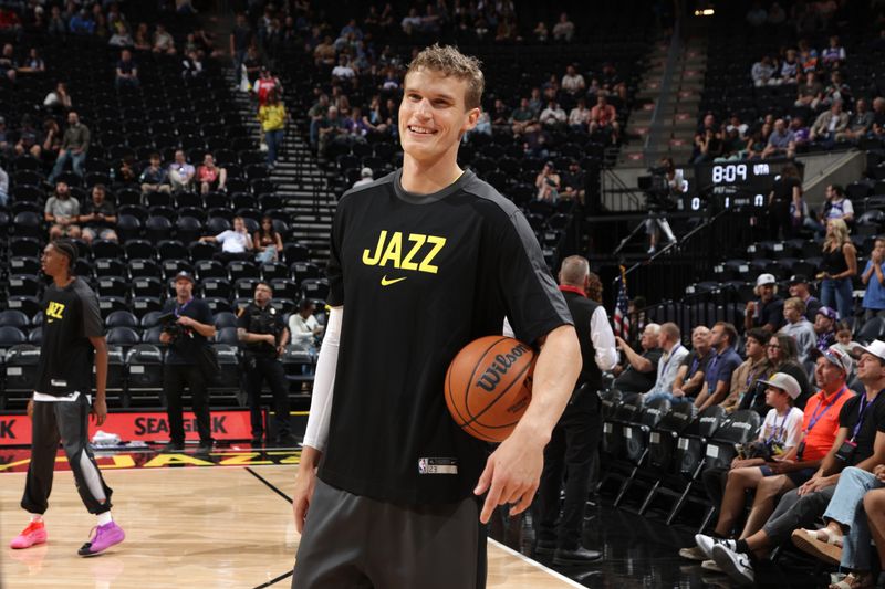 SALT LAKE CITY, UT - OCTOBER 7: Lauri Markkanen #23 of the Utah Jazz smiles before the game against the Houston Rockets during a NBA preseason game on October 7, 2024 at the Delta Center in Salt Lake City, Utah. NOTE TO USER: User expressly acknowledges and agrees that, by downloading and or using this Photograph, User is consenting to the terms and conditions of the Getty Images License Agreement. Mandatory Copyright Notice: Copyright 2024 NBAE (Photo by Melissa Majchrzak/NBAE via Getty Images)