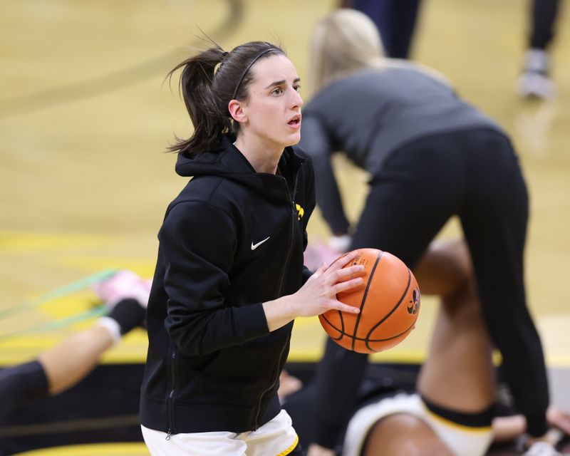 Feb 15, 2024; Iowa City, Iowa, USA; Iowa Hawkeyes guard Caitlin Clark (22) warms up before her game with the Michigan Wolverines at Carver-Hawkeye Arena. Mandatory Credit: Reese Strickland-USA TODAY Sports