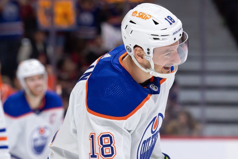 Mar 24, 2024; Ottawa, Ontario, CAN; Edmonton Oilers left wing Zach Hyman (18) skates to the bench after scoring in the second period against the Ottawa Senators at the Canadian Tire Centre. Mandatory Credit: Marc DesRosiers-USA TODAY Sports