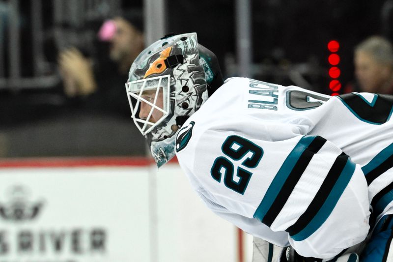 Nov 10, 2024; Newark, New Jersey, USA; San Jose Sharks goaltender Mackenzie Blackwood (29) during the second period against the New Jersey Devils at Prudential Center. Mandatory Credit: John Jones-Imagn Images