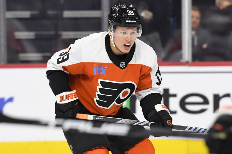 Sep 26, 2024; Philadelphia, Pennsylvania, USA; Philadelphia Flyers right wing Matvei Michkov (39) skates against the New York Islanders during the first period at Wells Fargo Center. Mandatory Credit: Eric Hartline-Imagn Images