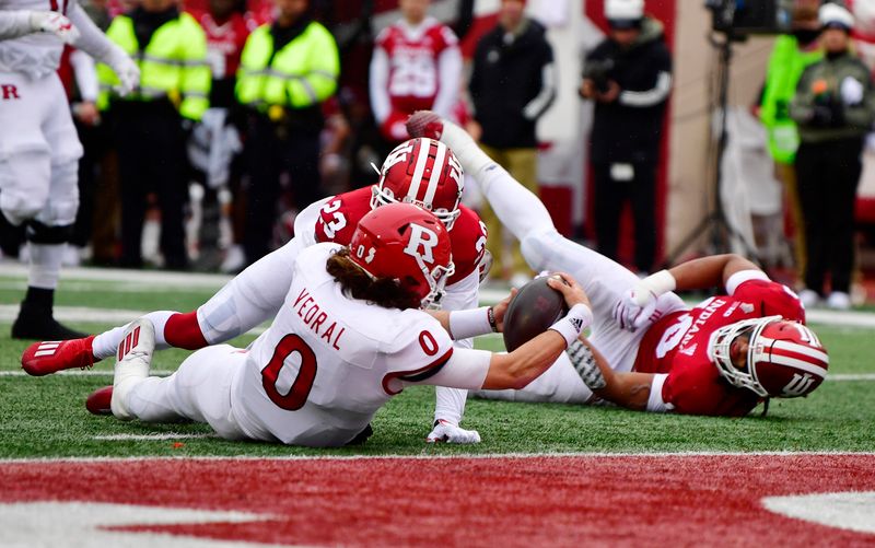 Nov 13, 2021; Bloomington, Indiana, USA;  Rutgers Scarlet Knights quarterback Noah Vedral (0) dives for a touchdown during the second half against the Indiana Hoosiers at Memorial Stadium. The Scarlet Knights won 38-3.  Mandatory Credit: Marc Lebryk-USA TODAY Sports