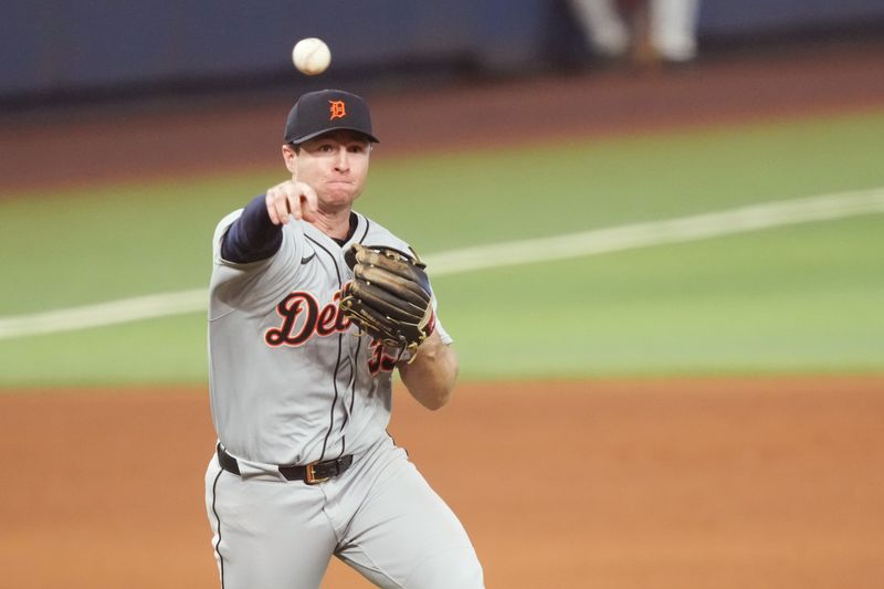 Sep 14, 2025; Miami, Florida, USA;  Detroit Tigers third baseman Colt Keith (33) throws out Miami Marlins’ Javier Sanoja in the seventh inning at first base at loanDepot Park. Mandatory Credit: Jim Rassol-Imagn Images