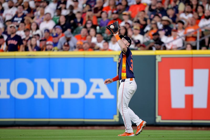 May 4, 2024; Houston, Texas, USA; Houston Astros right fielder Kyle Tucker (30) catches a fly ball for an out against the Seattle Mariners during the third inning at Minute Maid Park. Mandatory Credit: Erik Williams-USA TODAY Sports