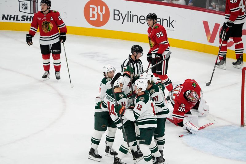 Nov 26, 2025; Chicago, Illinois, USA; Minnesota Wild left wing Matt Boldy (12) celebrates his goal during the third period at United Center. Mandatory Credit: David Banks-Imagn Images