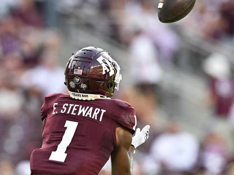 Sep 2, 2023; College Station, Texas, USA; Texas A&M Aggies wide receiver Evan Stewart (1) receives a touchdown pass from quarterback Conner Weigman (not pictured) during the second quarter against the New Mexico Lobos at Kyle Field. Mandatory Credit: Maria Lysaker-USA TODAY Sports