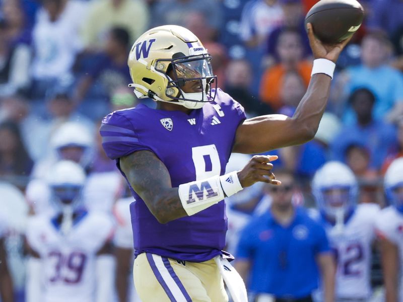 Sep 2, 2023; Seattle, Washington, USA; Washington Huskies quarterback Michael Penix Jr. (9) throws for a touchdown against the Boise State Broncos during the second quarter at Alaska Airlines Field at Husky Stadium. Mandatory Credit: Joe Nicholson-USA TODAY Sports