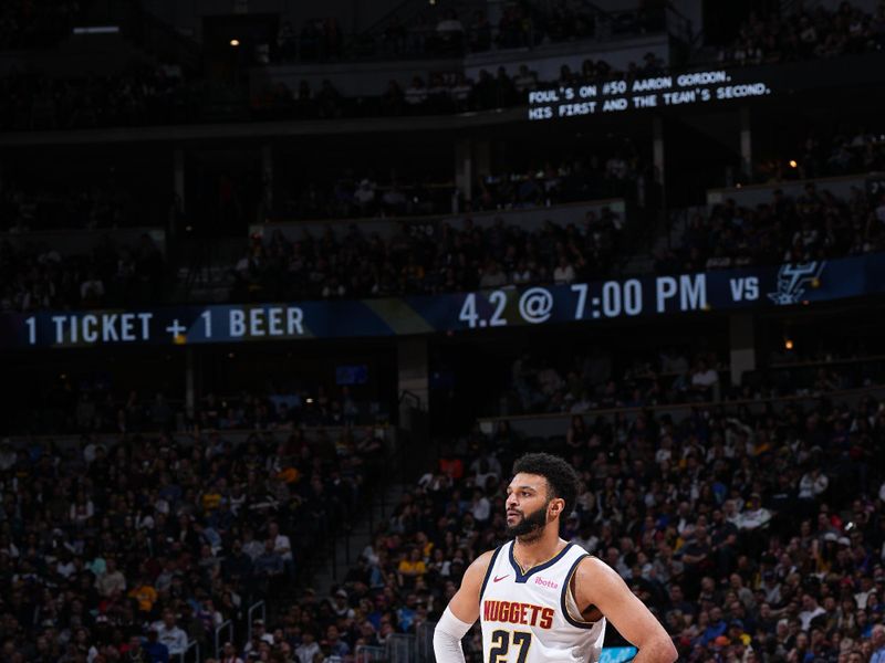 DENVER, CO - MARCH 21: Jamal Murray #27 of the Denver Nuggets looks on during the game against the New York Knicks on March 21, 2024 at the Ball Arena in Denver, Colorado. NOTE TO USER: User expressly acknowledges and agrees that, by downloading and/or using this Photograph, user is consenting to the terms and conditions of the Getty Images License Agreement. Mandatory Copyright Notice: Copyright 2024 NBAE (Photo by Garrett Ellwood/NBAE via Getty Images)