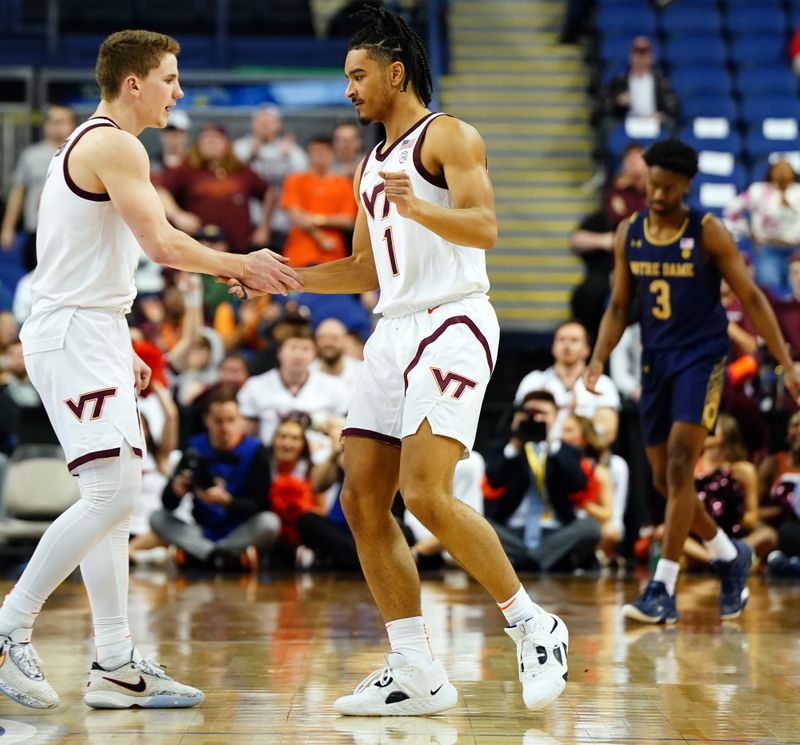 Mar 7, 2023; Greensboro, NC, USA; Virginia Tech Hokies guard Rodney Rice (1) races to his three point bucket against the Notre Dame Fighting Irish during the second half of the first round of the ACC tournament at Greensboro Coliseum. Mandatory Credit: John David Mercer-USA TODAY Sports