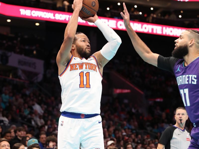 CHARLOTTE, NC -NOVEMBER 29:  Jalen Brunson #11 of the New York Knicks shoots the ball against the Charlotte Hornets during the Emirates NBA Cup Game on November, 29, 2024 at Spectrum Center in Charlotte, North Carolina. NOTE TO USER: User expressly acknowledges and agrees that, by downloading and or using this photograph, User is consenting to the terms and conditions of the Getty Images License Agreement. Mandatory Copyright Notice: Copyright 2024 NBAE (Photo by Brock Williams-Smith/NBAE via Getty Images)