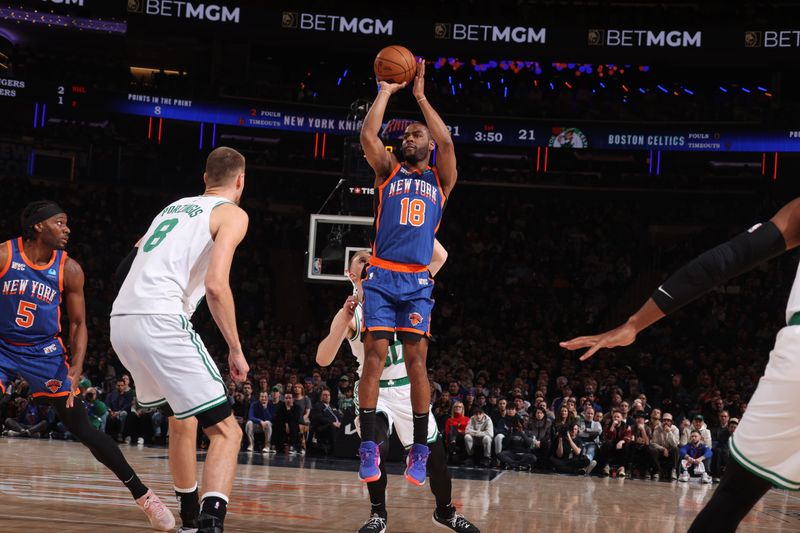 NEW YORK, NY - FEBRUARY 24: Alec Burks #18 of the New York Knicks shoots the ball during the game against the Boston Celtics on February 24, 2024 at Madison Square Garden in New York City, New York.  NOTE TO USER: User expressly acknowledges and agrees that, by downloading and or using this photograph, User is consenting to the terms and conditions of the Getty Images License Agreement. Mandatory Copyright Notice: Copyright 2024 NBAE  (Photo by Nathaniel S. Butler/NBAE via Getty Images)