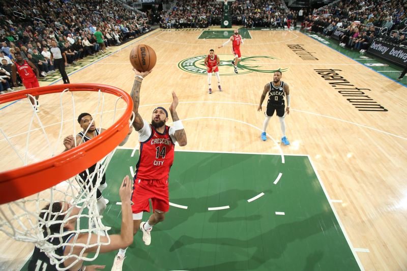 MILWAUKEE, WI - JANUARY 27:  Brandon Ingram #14 of the New Orleans Pelicans goes to the basket during the game on January 27, 2024 at the Fiserv Forum Center in Milwaukee, Wisconsin. NOTE TO USER: User expressly acknowledges and agrees that, by downloading and or using this Photograph, user is consenting to the terms and conditions of the Getty Images License Agreement. Mandatory Copyright Notice: Copyright 2024 NBAE (Photo by Gary Dineen/NBAE via Getty Images).