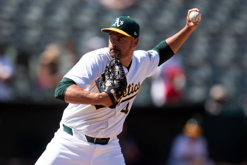 Jul 6, 2024; Oakland, California, USA; Oakland Athletics pitcher T.J. McFarland (48) delivers a pitch against the Baltimore Orioles during the ninth inning at Oakland-Alameda County Coliseum. Mandatory Credit: D. Ross Cameron-USA TODAY Sports