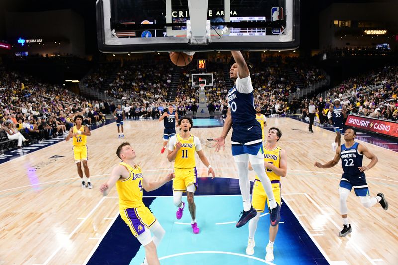 PALM SPRINGS, CA - OCTOBER 4: Terrence Shannon #00 of the Minnesota Timberwolves dunks the ball during the game against the Los Angeles Lakers during an NBA preseason game on October 4, 2024 at Acrisure Arena in Palm Springs, California. NOTE TO USER: User expressly acknowledges and agrees that, by downloading and/or using this Photograph, user is consenting to the terms and conditions of the Getty Images License Agreement. Mandatory Copyright Notice: Copyright 2024 NBAE (Photo by Adam Pantozzi/NBAE via Getty Images)