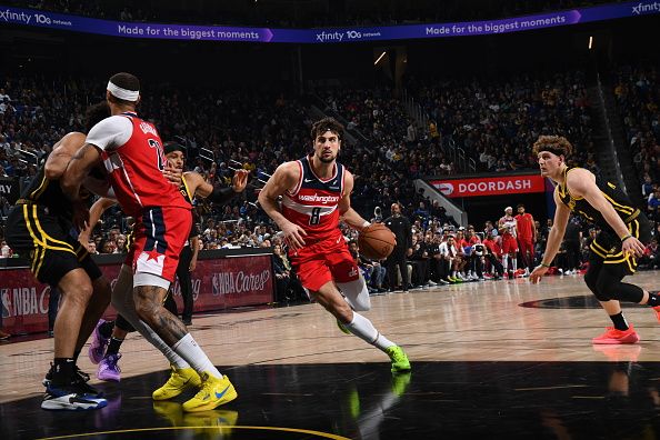 SAN FRANCISCO, CA - DECEMBER 22: Deni Avdija #8 of the Washington Wizards drives to the basket during the game against the Golden State Warriors on December 22, 2023 at Chase Center in San Francisco, California. NOTE TO USER: User expressly acknowledges and agrees that, by downloading and or using this photograph, user is consenting to the terms and conditions of Getty Images License Agreement. Mandatory Copyright Notice: Copyright 2023 NBAE (Photo by Noah Graham/NBAE via Getty Images)