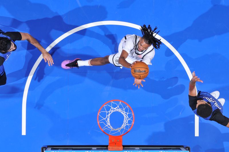 ORLANDO, FL - OCTOBER 25: Ziaire Williams #1 of the Brooklyn Nets drives to the basket during the game against the Orlando Magic on October 25, 2024 at Kia Center in Orlando, Florida. NOTE TO USER: User expressly acknowledges and agrees that, by downloading and or using this photograph, User is consenting to the terms and conditions of the Getty Images License Agreement. Mandatory Copyright Notice: Copyright 2024 NBAE (Photo by Fernando Medina/NBAE via Getty Images)