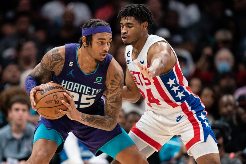 CHARLOTTE, NORTH CAROLINA - NOVEMBER 05: Cam Thomas #24 of the Brooklyn Nets guards P.J. Washington #25 of the Charlotte Hornets in the fourth quarter during their game at Spectrum Center on November 05, 2022 in Charlotte, North Carolina. NOTE TO USER: User expressly acknowledges and agrees that, by downloading and or using this photograph, User is consenting to the terms and conditions of the Getty Images License Agreement. (Photo by Jacob Kupferman/Getty Images)