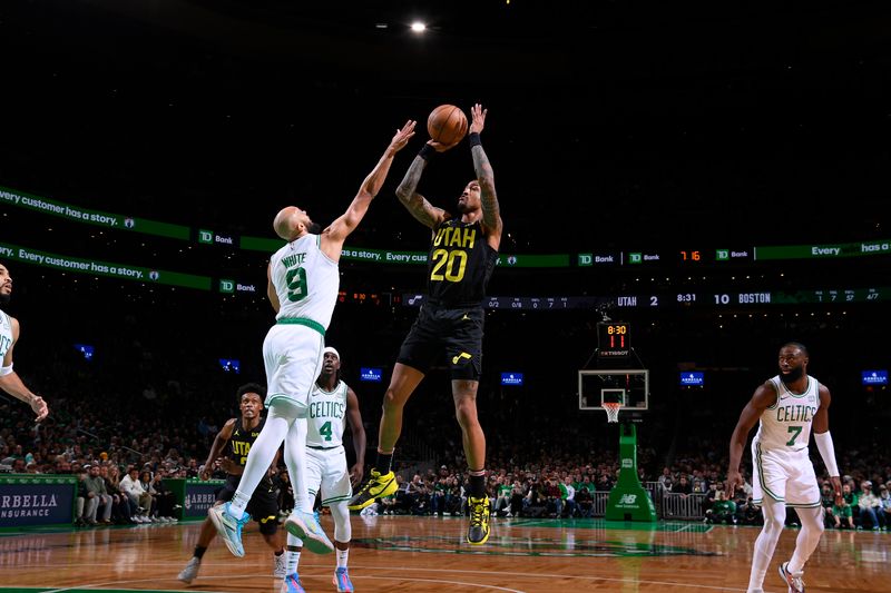 BOSTON, MA - JANUARY 5: John Collins #20 of the Utah Jazz shoots the ball during the game against the Boston Celtics on January 5, 2024 at the TD Garden in Boston, Massachusetts. NOTE TO USER: User expressly acknowledges and agrees that, by downloading and or using this photograph, User is consenting to the terms and conditions of the Getty Images License Agreement. Mandatory Copyright Notice: Copyright 2024 NBAE  (Photo by Brian Babineau/NBAE via Getty Images)