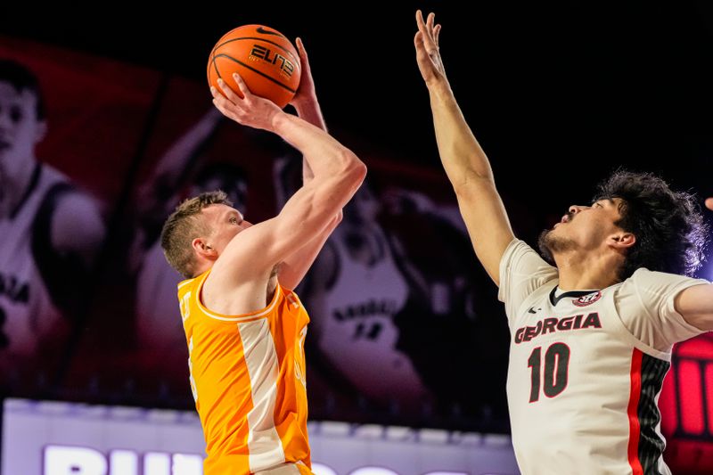 Jan 13, 2024; Athens, Georgia, USA; Tennessee Volunteers guard Dalton Knecht (3) shoots over Georgia Bulldogs guard RJ Sunahara (10) at Stegeman Coliseum. Mandatory Credit: Dale Zanine-USA TODAY Sports