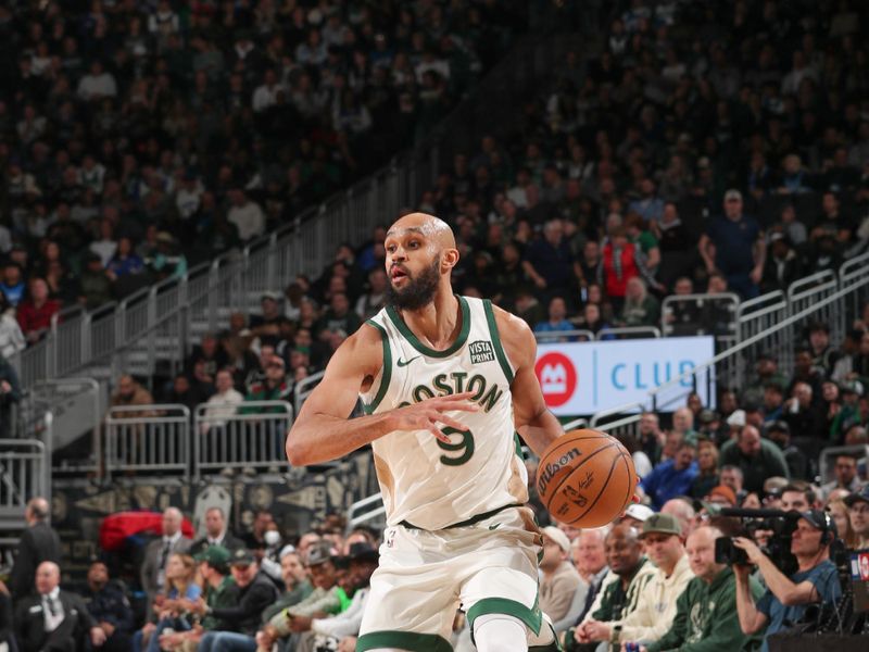 MILWAUKEE, WI - JANUARY 11:  Derrick White #9 of the Boston Celtics goes to the basket during the game on January 11, 2024 at the Fiserv Forum Center in Milwaukee, Wisconsin. NOTE TO USER: User expressly acknowledges and agrees that, by downloading and or using this Photograph, user is consenting to the terms and conditions of the Getty Images License Agreement. Mandatory Copyright Notice: Copyright 2024 NBAE (Photo by Gary Dineen/NBAE via Getty Images).