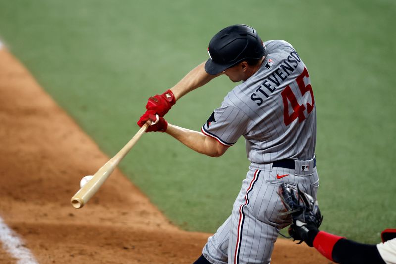 Sep 2, 2023; Arlington, Texas, USA; Minnesota Twins center fielder Andrew Stevenson (45) grounds out in the sixth inning against the Texas Rangers at Globe Life Field. Mandatory Credit: Tim Heitman-USA TODAY Sports