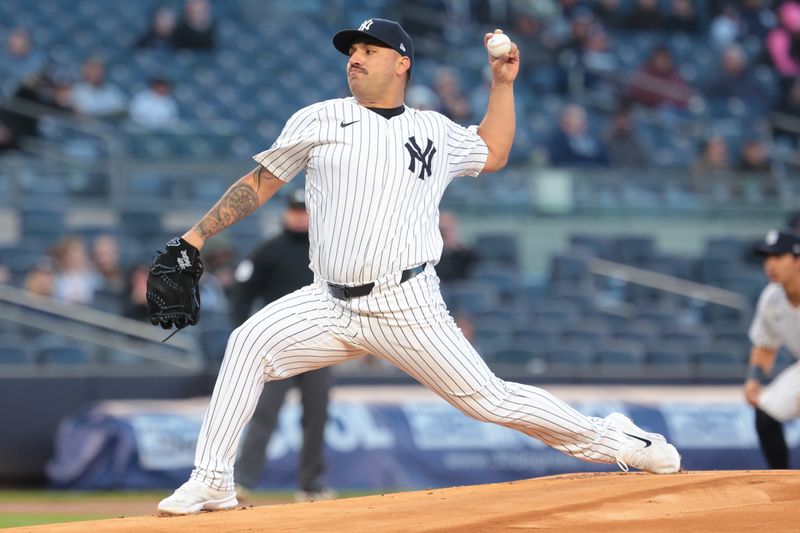 Apr 25, 2024; Bronx, New York, USA; New York Yankees starting pitcher Nestor Cortes (65) delivers a pitch during the first inning against the Oakland Athletics at Yankee Stadium. Mandatory Credit: Vincent Carchietta-USA TODAY Sports