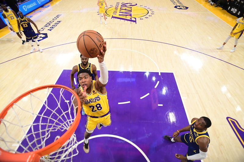 LOS ANGELES, CA - APRIL 9: Rui Hachimura #28 of the Los Angeles Lakers drives to the basket during the game against the Golden State Warriors on April 9, 2024 at Crypto.Com Arena in Los Angeles, California. NOTE TO USER: User expressly acknowledges and agrees that, by downloading and/or using this Photograph, user is consenting to the terms and conditions of the Getty Images License Agreement. Mandatory Copyright Notice: Copyright 2024 NBAE (Photo by Adam Pantozzi/NBAE via Getty Images)