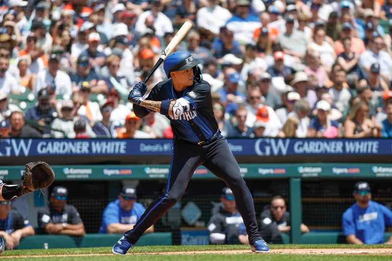 May 25, 2024; Detroit, Michigan, USA; Detroit Tigers third baseman Gio Urshela (13) looks on during an at bat in the first inning of the game against the Toronto Blue Jays at Comerica Park. Mandatory Credit: Brian Bradshaw Sevald-USA TODAY Sports